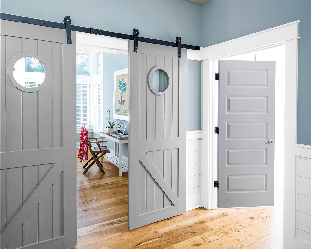 Doors painted in ADVANCE Interior Paint in Storm AF-700, Satin finish; Walls: Nimbus Gray 2131-50, Regal Select, Matte; Trim: Pure White OC-64, Regal® Select, Pearl
