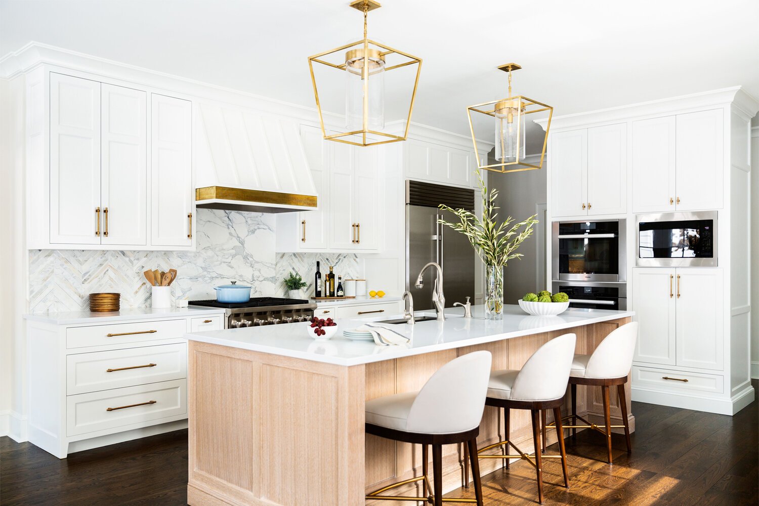 Benjamin Moore White Dove kitchen cabinets; design by A-List Interiors, photo by Brittany Ambridge