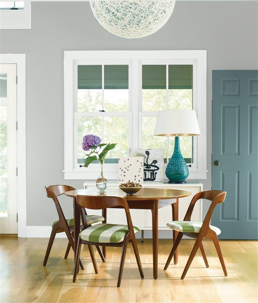 Benjamin Moore Coventry Gray dining room, Decorator’s White trim, Aegean Teal door