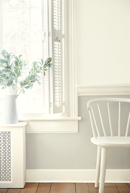 Benjamin Moore Decorator’s White on trim and shutters, with Benjamin Moore Gray Owl wall paint