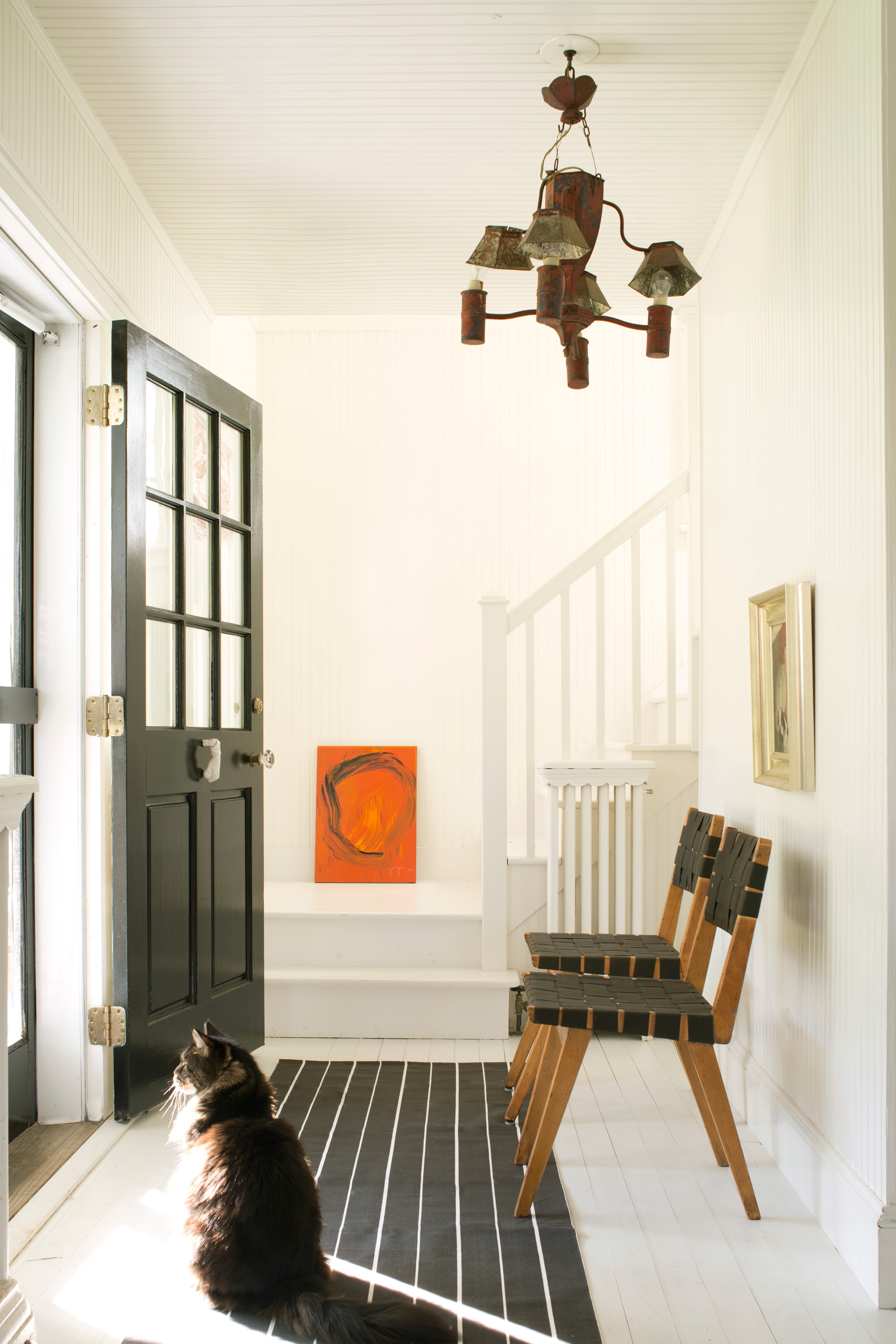 Benjamin Moore White Dove OC-17 is a bright, but warm paint color in a well-lit entrance