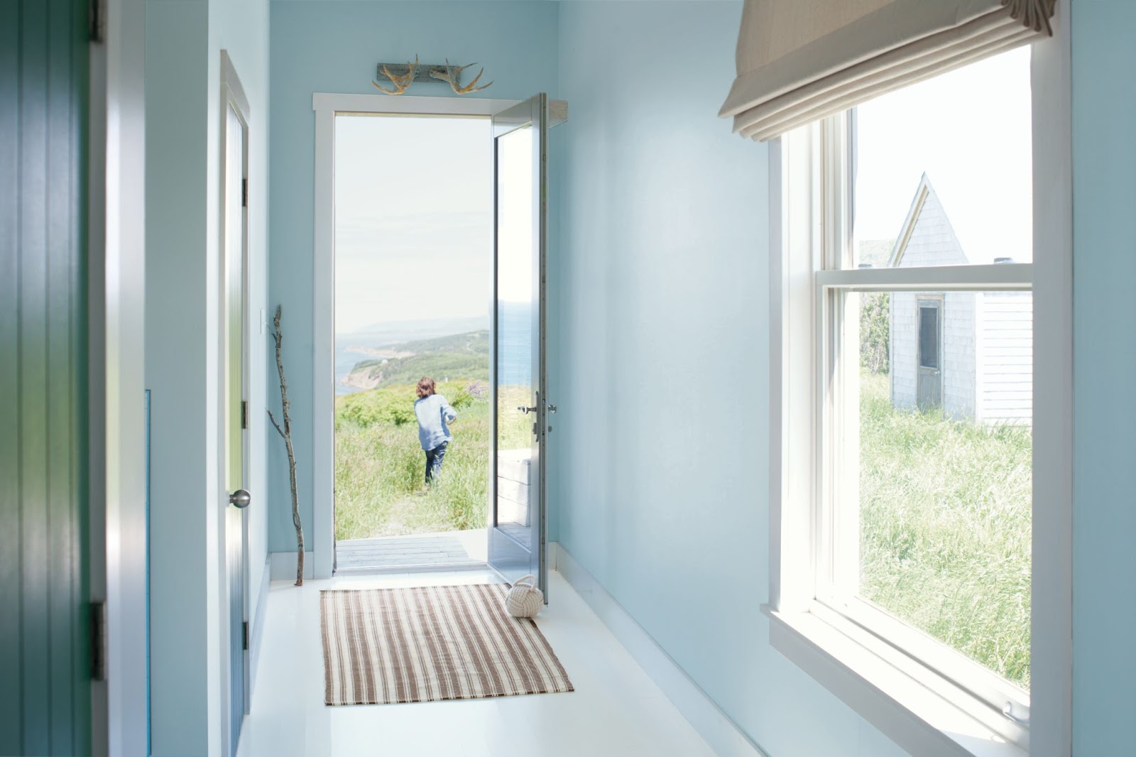 Benjamin Moore Breath of Fresh Air wall color is paired with trim in Benjamin Moore White Dove OC-17