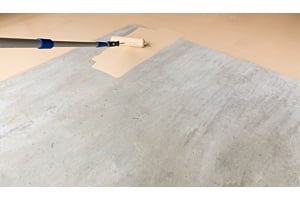 image of concrete floor being painted