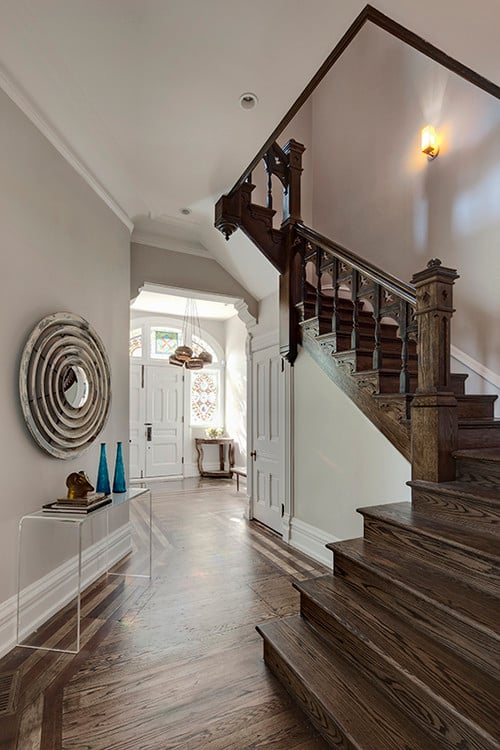 Entryway and stairwell painted in Benjamin Moore Balboa Mist
