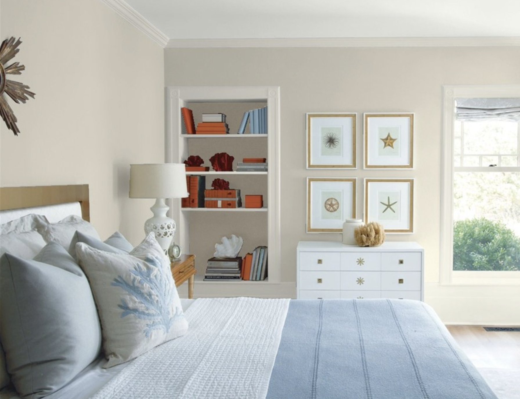 Coastal style bedroom in Benjamin Moore Revere Pewter, trim color Benjamin Moore Dove Wing OC-18