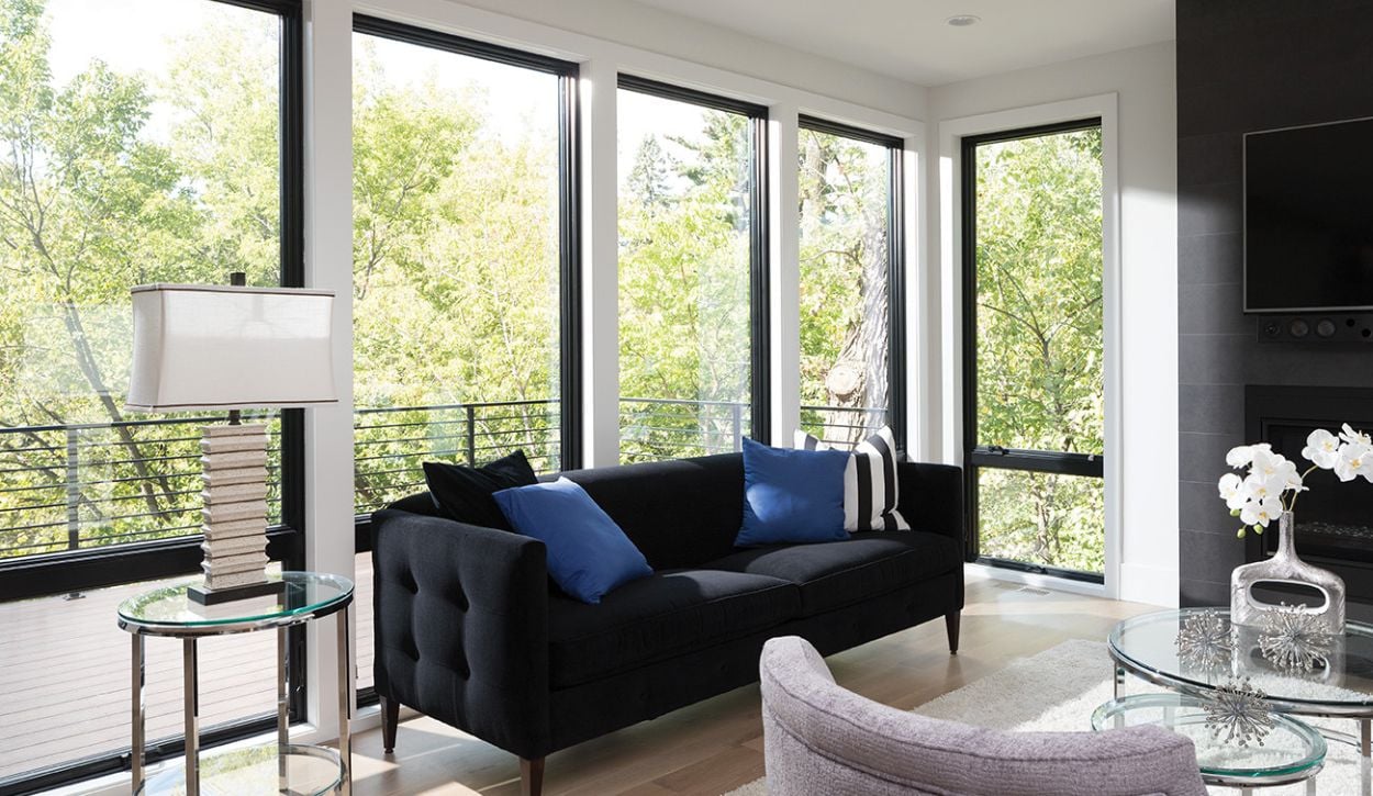 Living room featuring Andersen 400 Series Awning, Casement & Picture Windows