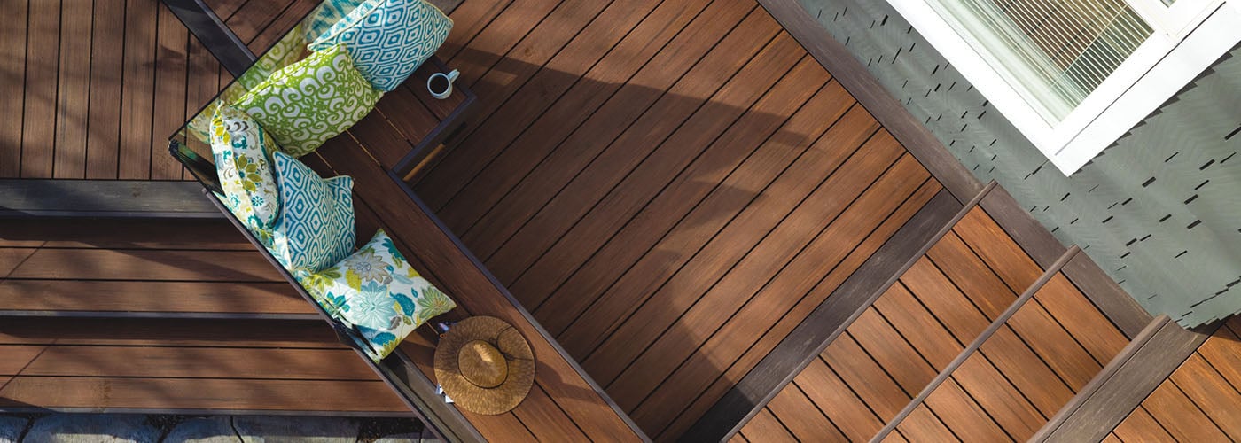 TimberTech Advanced PVC in Mahogany, with a Dark Hickory border