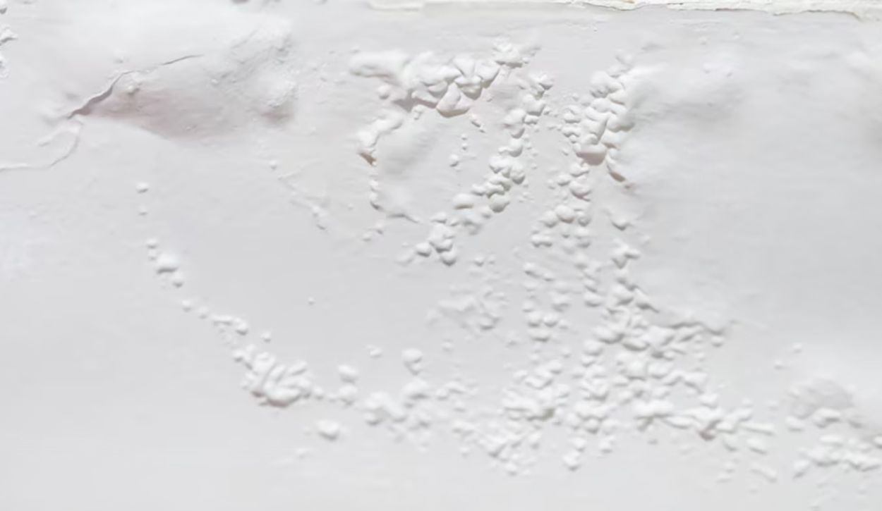 Wall with paint bubbling