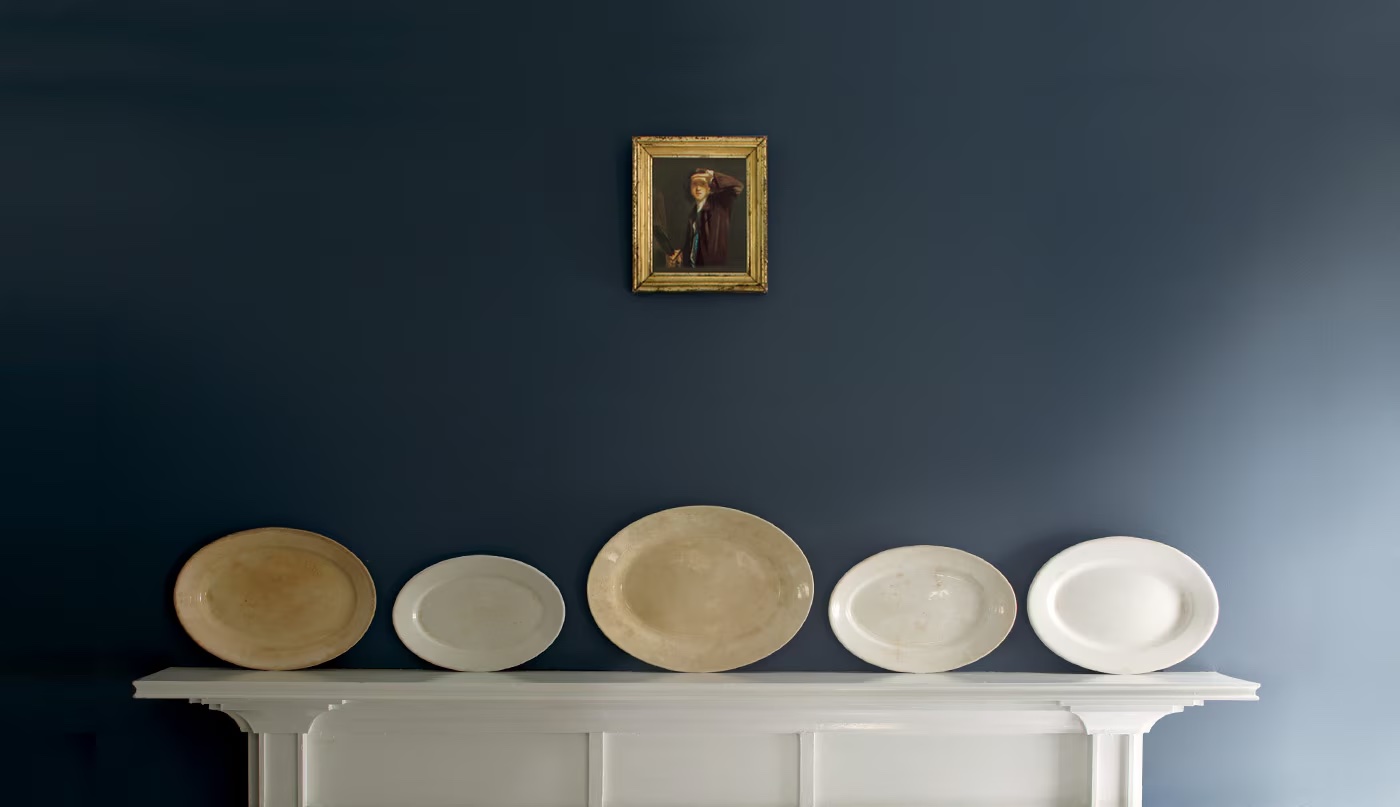 Pantry shelves painted in Edgecomb Gray