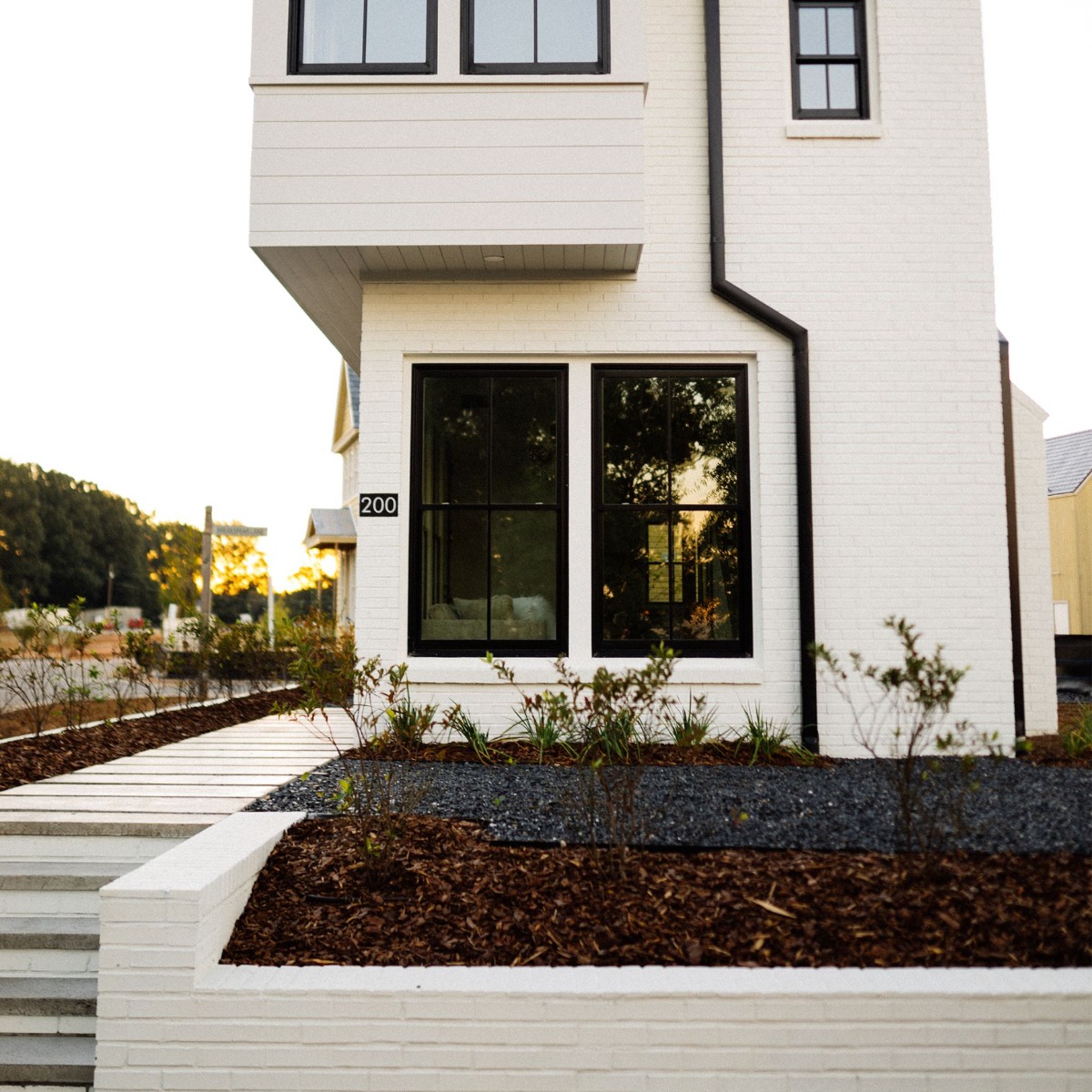 white brick house painted with masonry paint