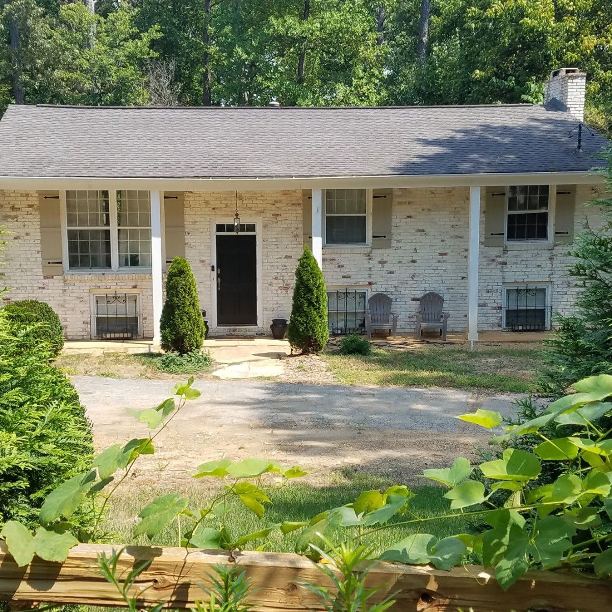  Riposo Beige Limewash updates a 1970’s brick split level home